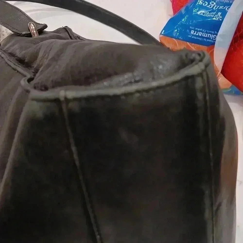 Rolf's Black leather shoulder bag with pockets
